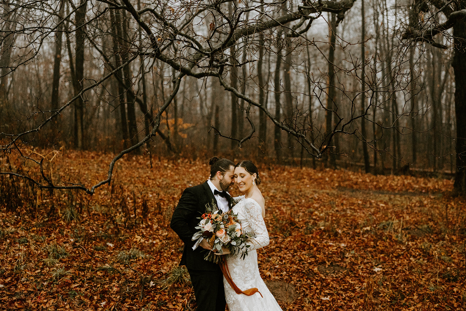 Bride and groom sharing an embrace during their Brush Creek Park wedding shoot with Lindsey Zern Photography