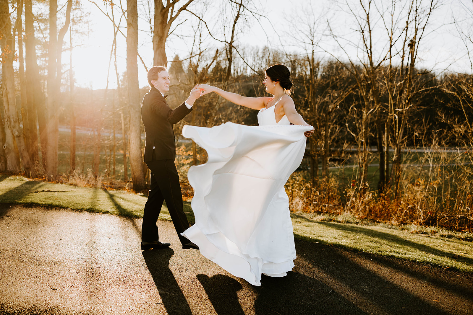 Bride and groom posing with each other during their golden hour wedding shoot with Lindsey Zern Photography